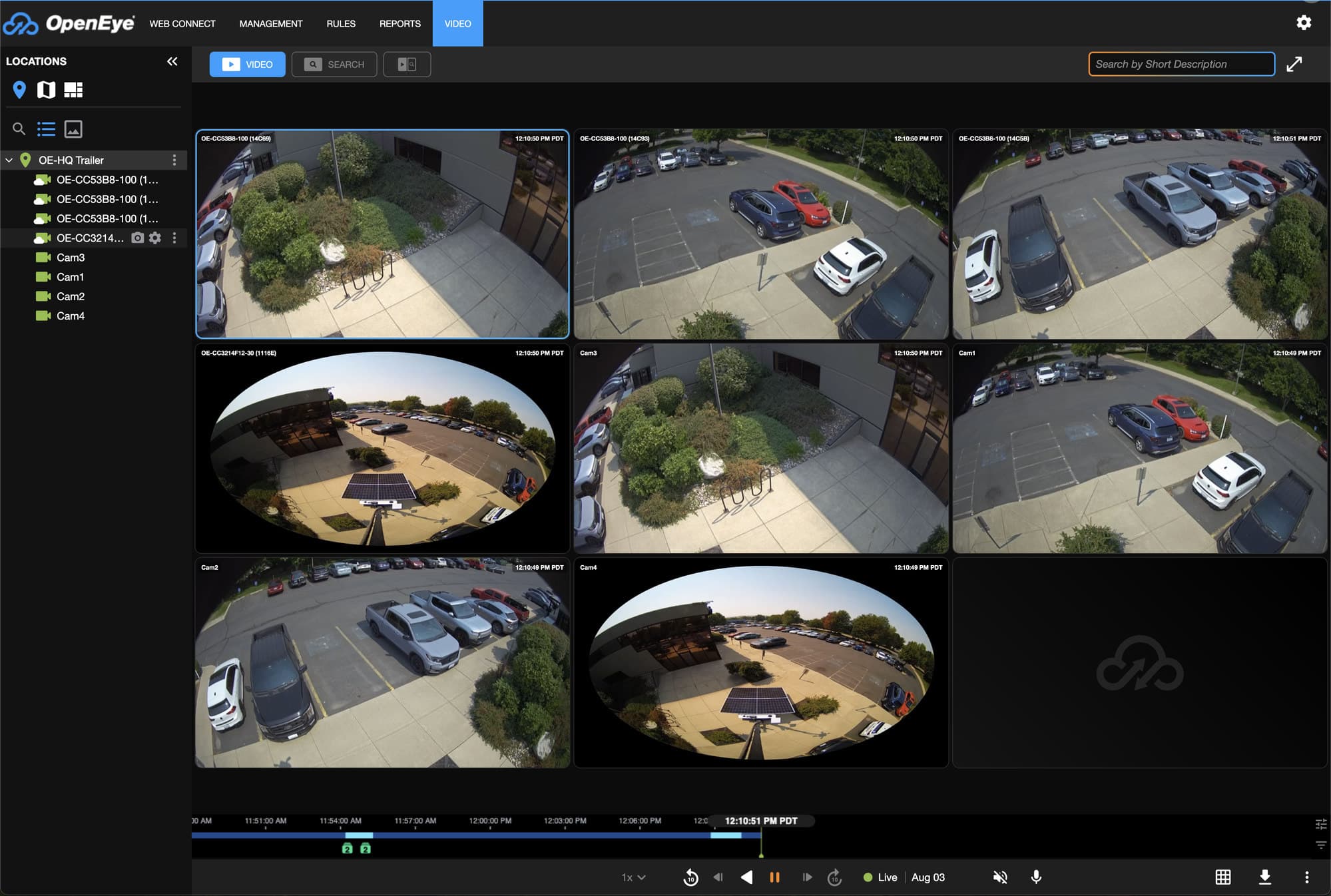 The OpenEye Web Services web client showing live views from every camera on a Sharpvue trailer — bullet and 360° fisheye feeds over a parking lot — with the playback timeline below.